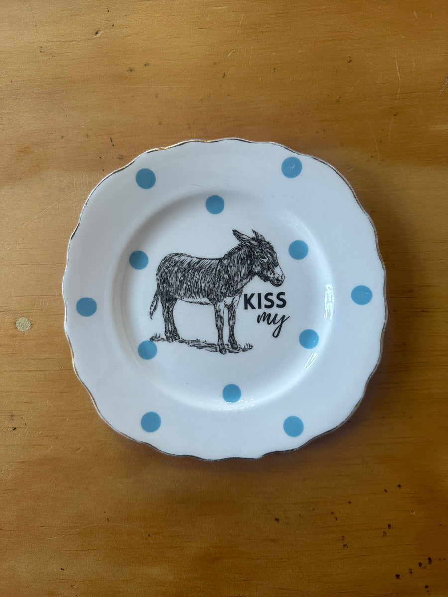 Kiss my…..